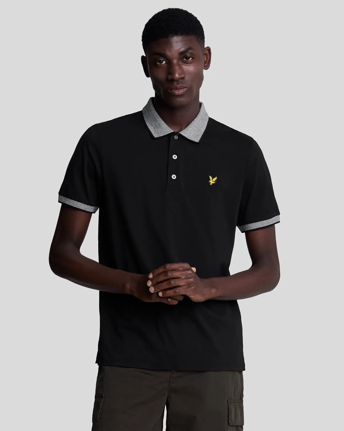 polohemd_mit_markenbesatz_0.webp Lyle & Scott Polohemden<Polohemd mit Markenbesatz JetBlack/White