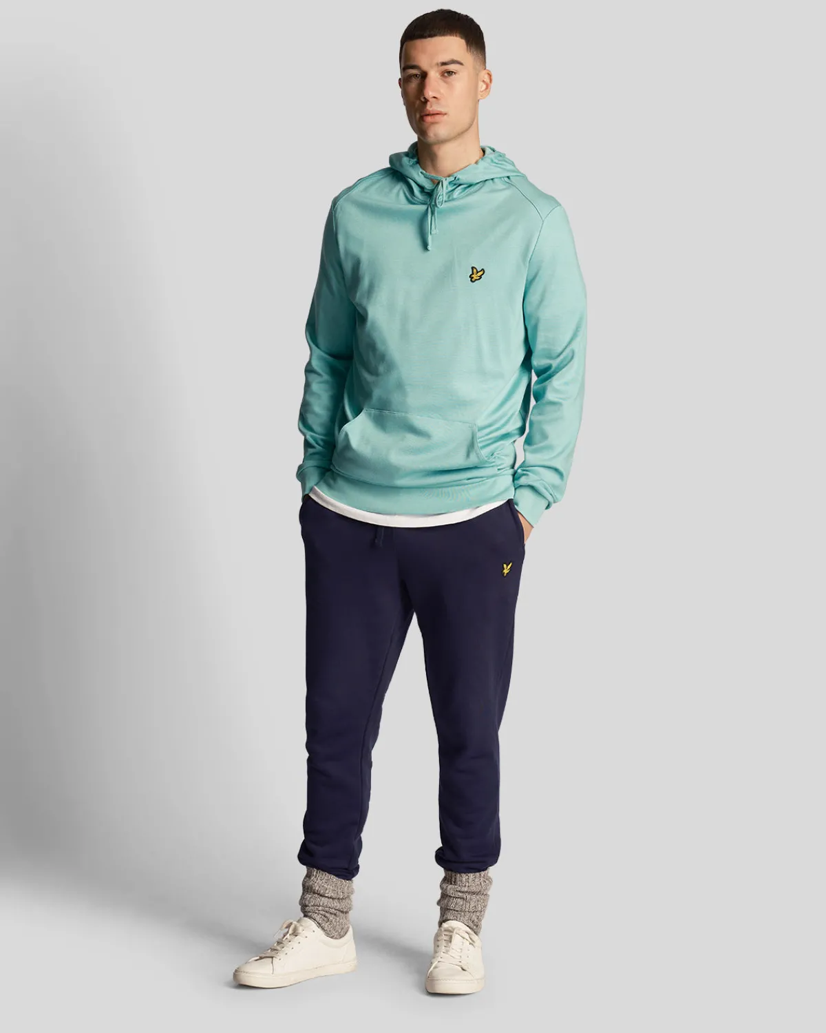 sport_fliege_fleece_hoodie_1-2.webp Lyle & Scott Sportbekleidung | Kapuzenpullover<Sport Fliege Fleece Hoodie Türkisblaugrün