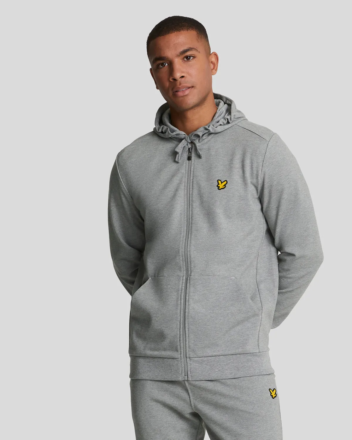 sportkapuzenpulli_mit_reiverschluss_0.webp Lyle & Scott Sportbekleidung | Kapuzenpullover<Sport-Kapuzenpulli mit Reißverschluss MidGreyMarl